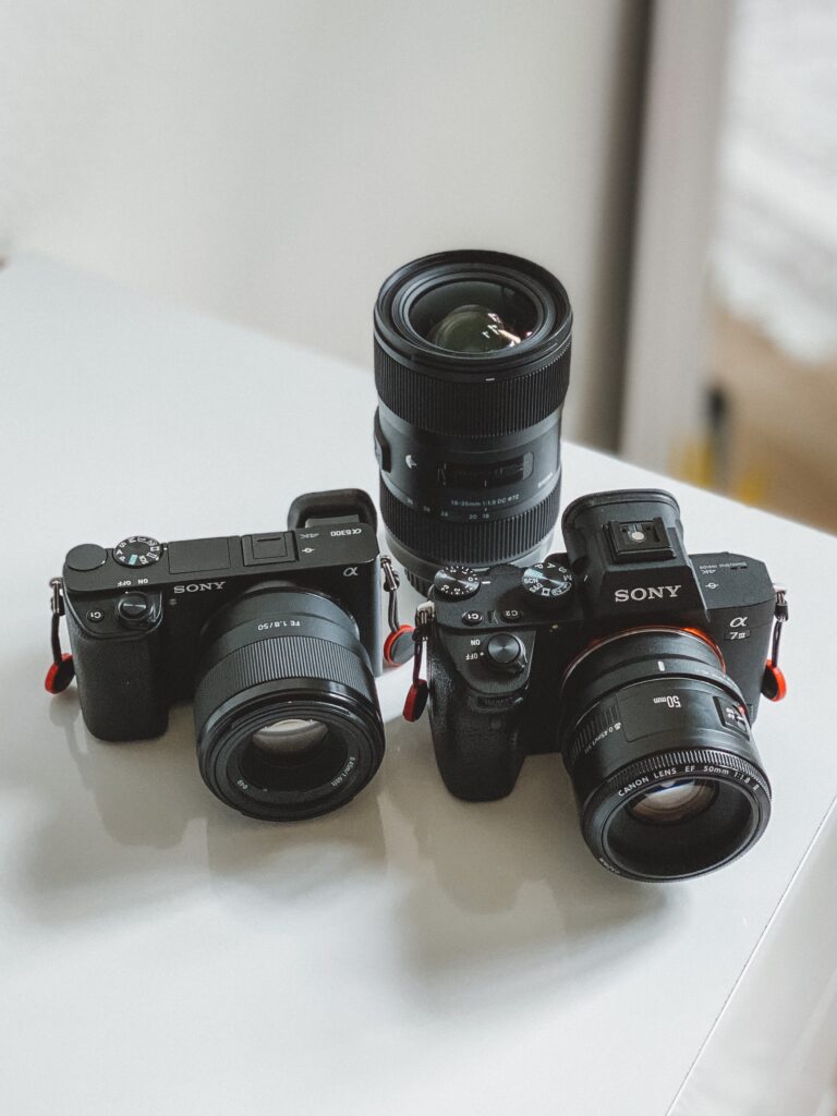 Sony Cameras Sitting On A Table