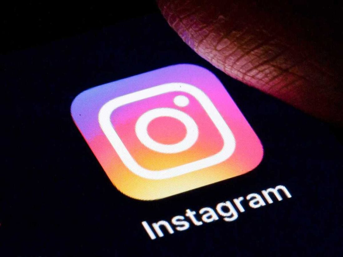Instagram App Being Pressed by Thumb